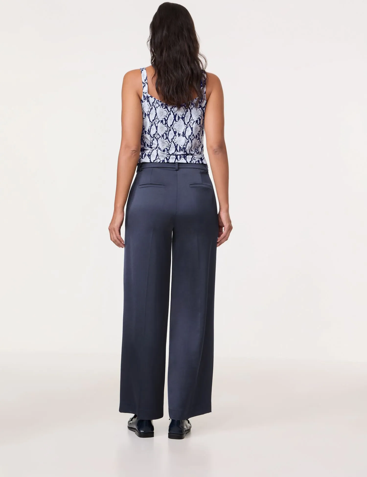 Wide trousers made of flowing satin